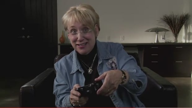 Mothers smiling and playing Dead Space 2 Multiplayer