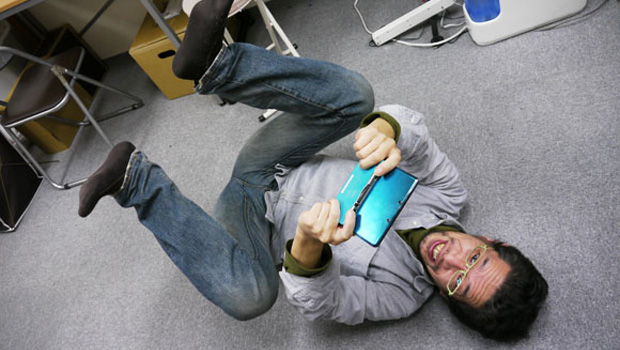 Japanese dude tries to look up an augmented reality skirt