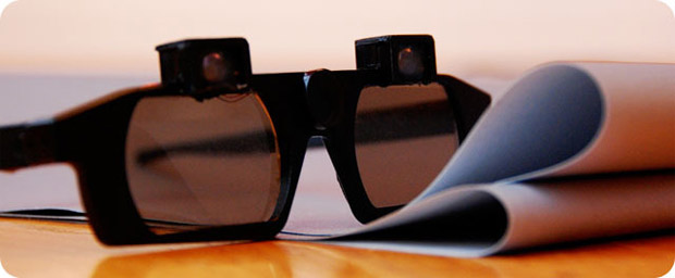 These castAR glasses do virtual and augmented reality