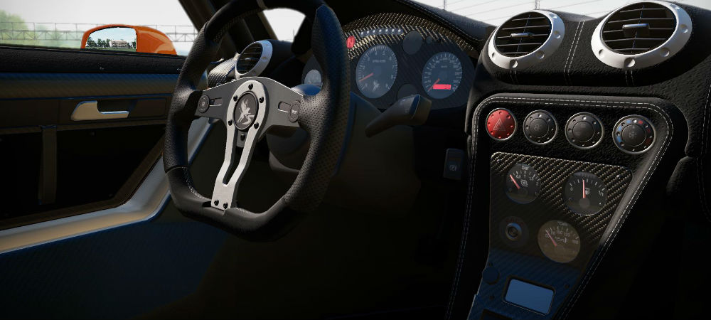 Project CARS has a dedicated windshield wiper button