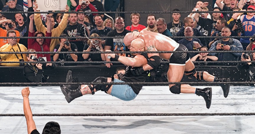 Glass breaks, music hits, and Stone Cold walks out as WWE 2K16 cover star