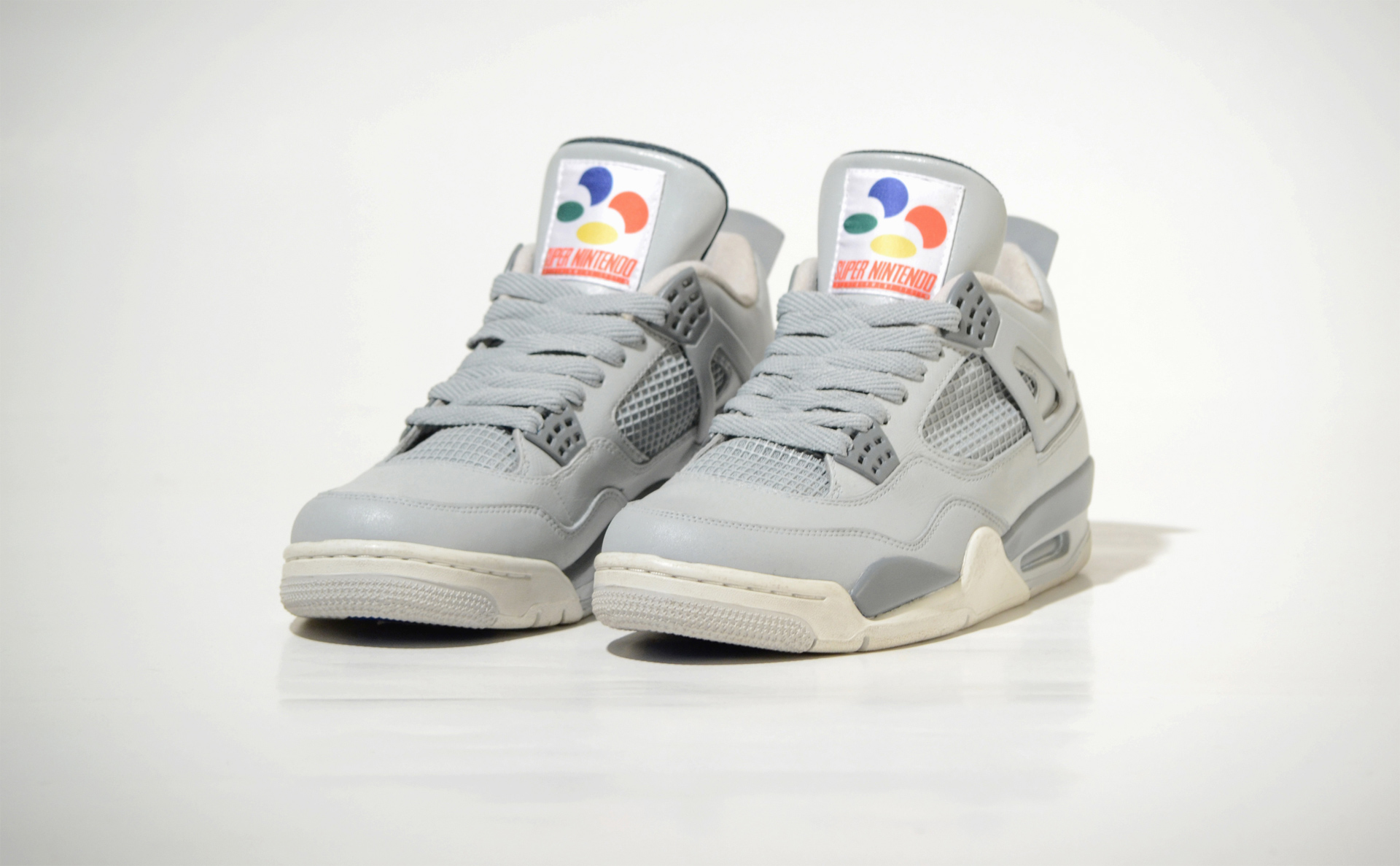 These Super Nintendo shoes have real buttons and a d-pad