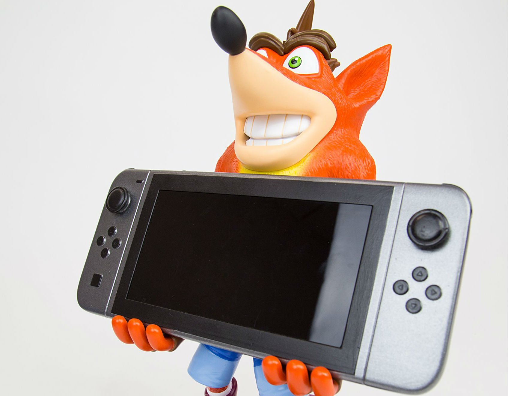 This Crash Bandicoot Switch holder will stare into your soul