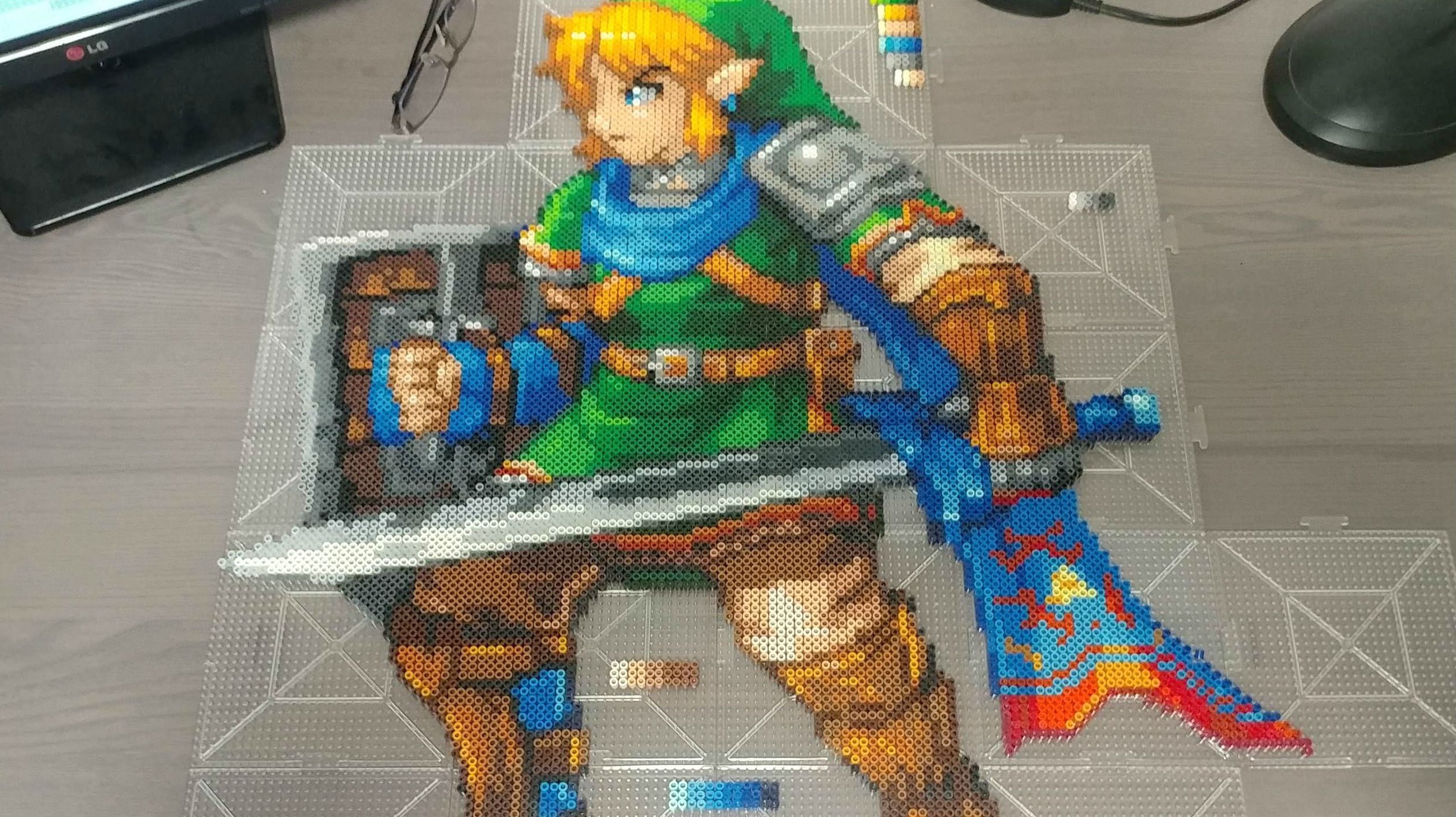 I'm extremely tempted to make this amazing Link bead art on my own