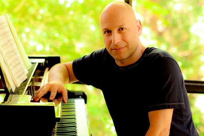 Watch composer Inon Zur play the Fallout 4 theme on piano